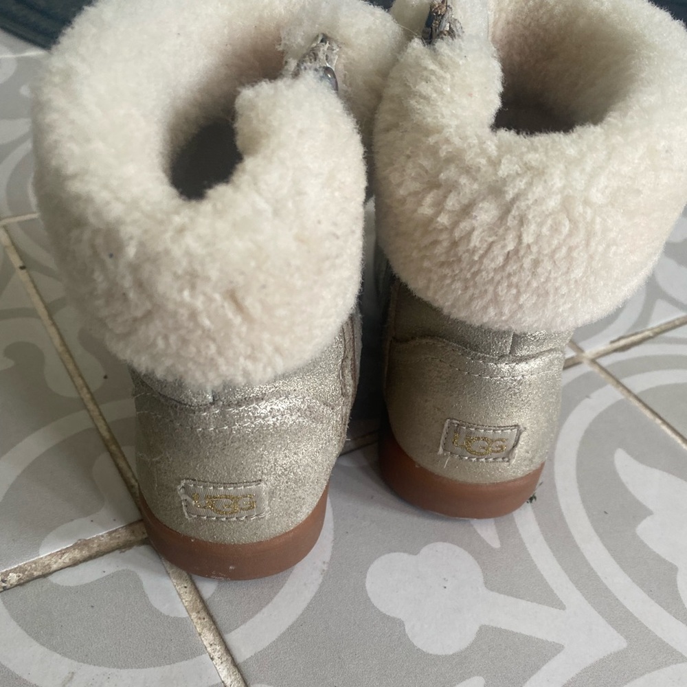 Girls gold Uggs 11